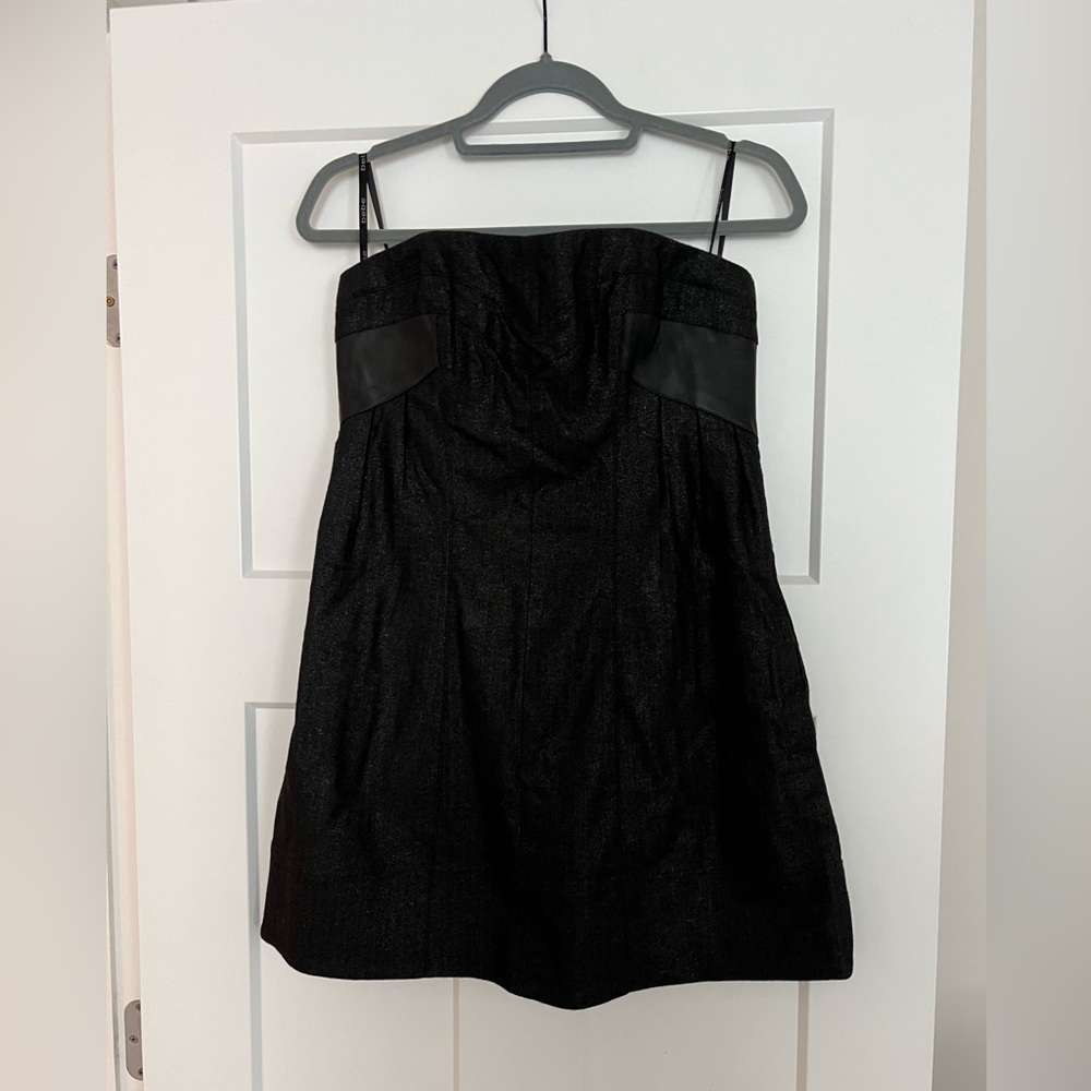 Black strapless mini dress by Bebe
